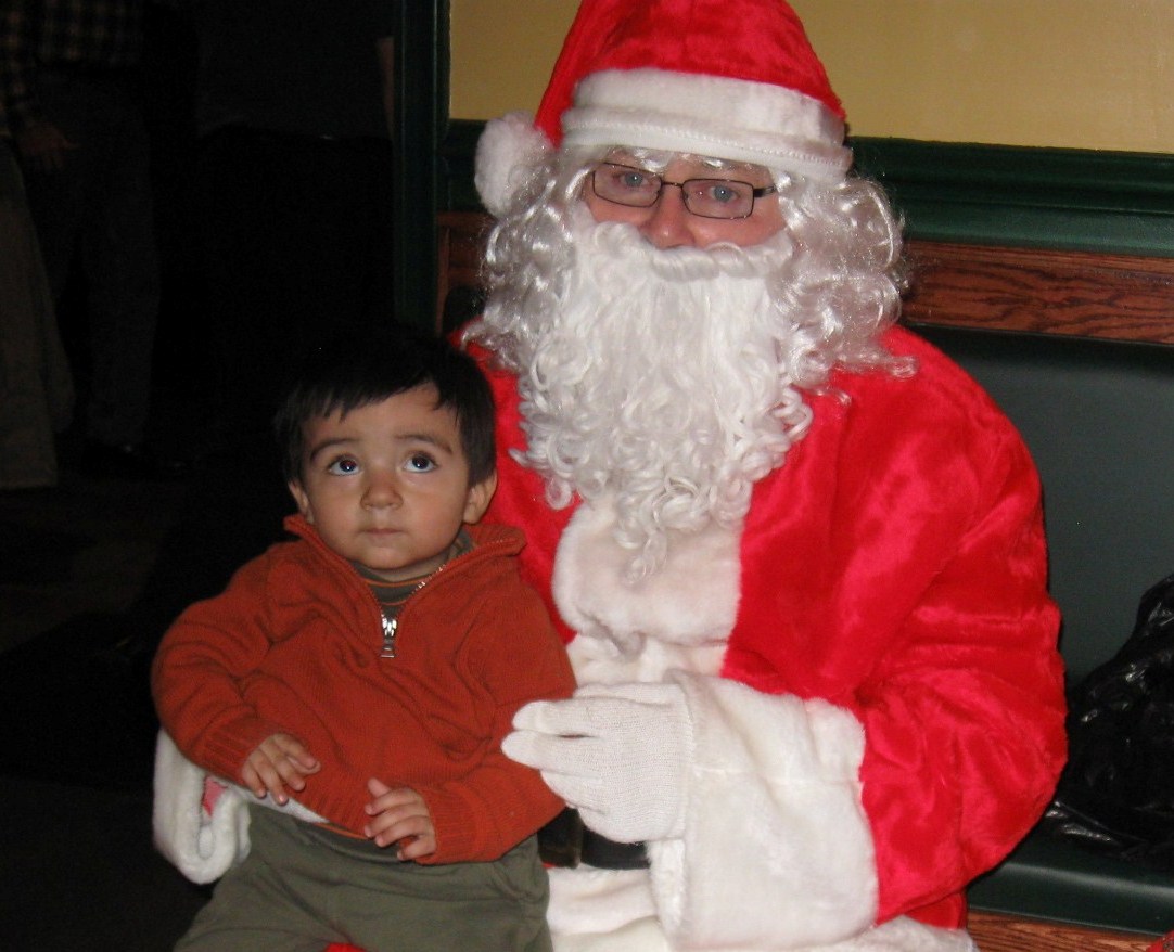 Sam gives eye rolls to Santa.JPG